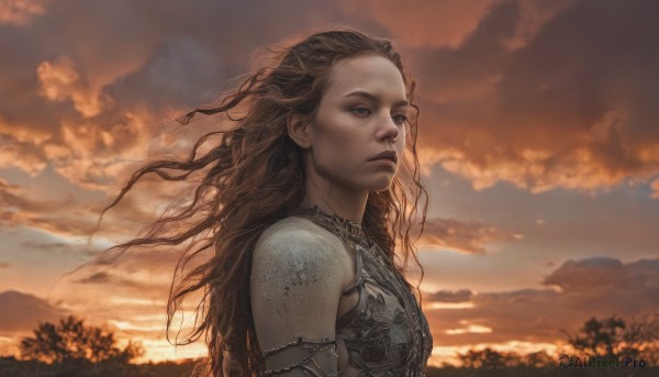 A female captured beautifully in a dynamic sunset outdoors