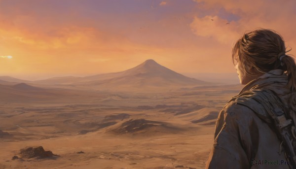 A male in the heart of a beautiful sunset outdoors