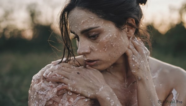 1girl,solo,long hair,brown hair,black hair,closed mouth,collarbone,upper body,nude,parted lips,blurry,black eyes,lips,wet,hands up,depth of field,blurry background,looking away,portrait,freckles,realistic,nose,bathing,wet hair,soap bubbles,water,hair bun,mole,looking down