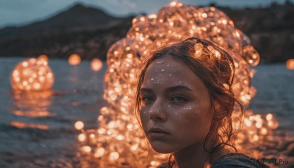 1girl, solo, short hair, brown hair, closed mouth, outdoors, blurry, lips, depth of field, blurry background, portrait, freckles, mountain, realistic