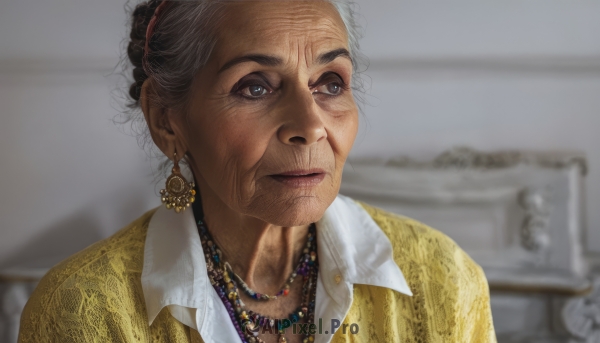 1girl,solo,blue eyes,shirt,black hair,jewelry,closed mouth,white shirt,upper body,grey hair,earrings,collared shirt,indoors,dark skin,necklace,hair bun,blurry,lips,looking to the side,blurry background,looking away,single hair bun,portrait,realistic,nose,old,old man,pearl necklace,old woman,wrinkled skin,real life insert