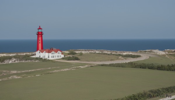 outdoors,sky,day,water,blue sky,no humans,ocean,beach,grass,building,scenery,horizon,river,castle,tower,landscape,shore,tree,nature,forest,road,field,path,lighthouse