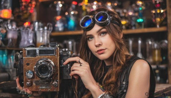 1girl,solo,long hair,looking at viewer,brown hair,holding,brown eyes,jewelry,upper body,sleeveless,indoors,blurry,bracelet,lips,sleeveless shirt,depth of field,blurry background,wavy hair,ring,goggles,eyewear on head,freckles,goggles on head,realistic,nose,camera,holding camera,signature,nail polish,grey eyes,watch,wristwatch,bokeh