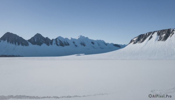 monochrome,outdoors,sky,day,tree,blue sky,no humans,nature,scenery,snow,blue theme,mountain,horizon,landscape,mountainous horizon,winter,footprints