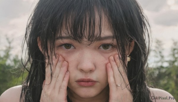 1girl,solo,long hair,looking at viewer,bangs,black hair,bare shoulders,brown eyes,jewelry,closed mouth,earrings,outdoors,day,blurry,lips,depth of field,blurry background,ring,portrait,close-up,freckles,realistic,nose,hands on own face,straight-on,hands on own cheeks,hands up,messy hair