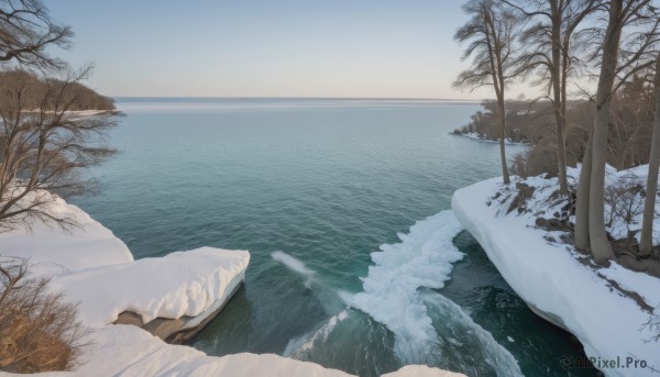 outdoors,sky,day,water,tree,blue sky,no humans,ocean,nature,scenery,snow,rock,mountain,horizon,winter,bare tree,river,landscape,lake,shore,cloud,beach,forest,waves