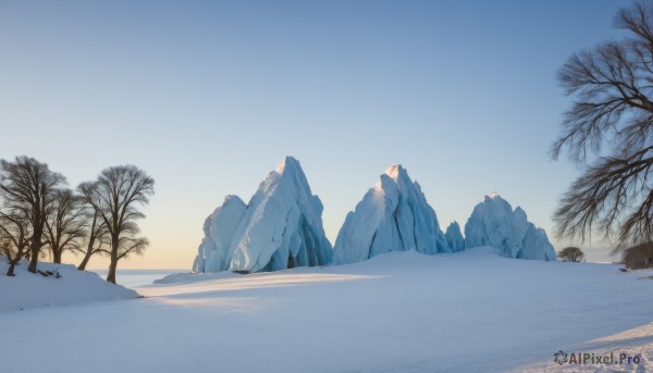 outdoors,sky,day,tree,blue sky,no humans,nature,scenery,snow,mountain,winter,bare tree,gradient sky,sunrise,footprints,shadow,ice,rock,sand,landscape,desert,frozen