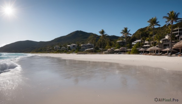 outdoors,sky,day,water,tree,blue sky,no humans,ocean,beach,sunlight,building,scenery,reflection,mountain,sand,palm tree,sun,shore,cloud,nature,rock,watercraft,house,landscape,desert,island