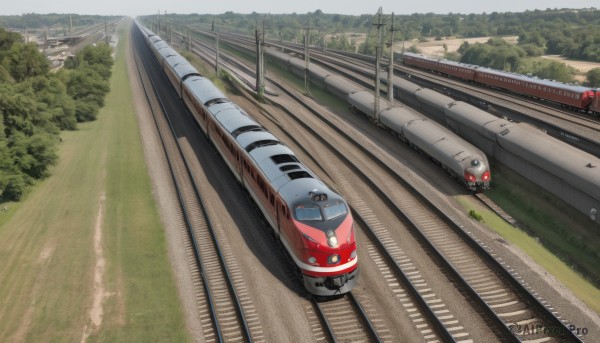 outdoors,day,tree,no humans,grass,ground vehicle,nature,scenery,motor vehicle,forest,car,road,bush,bridge,vehicle focus,railroad tracks,sky,cloud,mountain,realistic,power lines,river,utility pole,landscape,train,real world location,guard rail