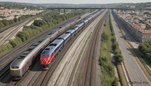 outdoors,day,tree,no humans,from above,ground vehicle,building,nature,scenery,motor vehicle,forest,city,car,road,cityscape,watercraft,bridge,vehicle focus,river,train,railroad tracks,sky,grass,mountain,realistic,landscape,real world location,guard rail