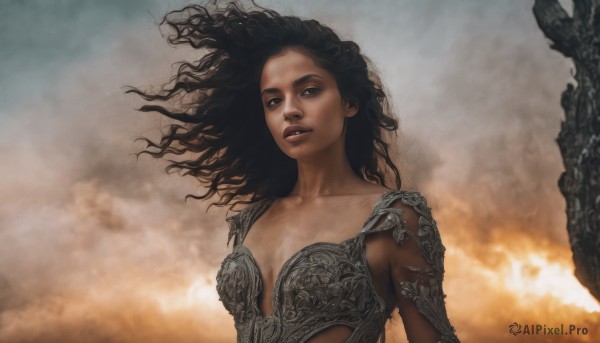 The timeless beauty of a female in a picturesque fiery cloud