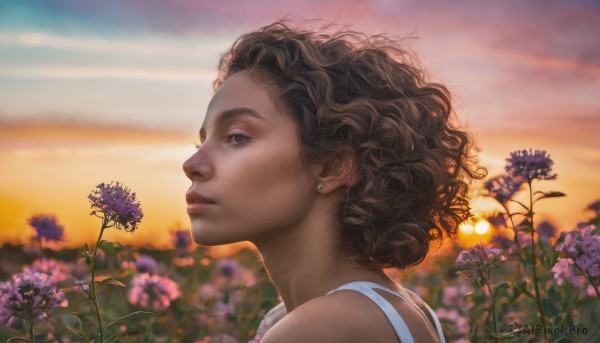 A breathtaking view of a female in sunset outdoors