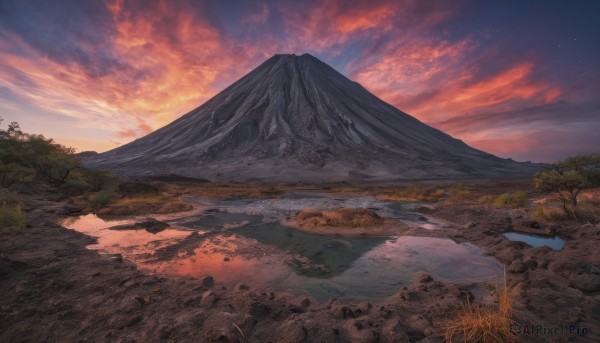 A majestic sunset outdoors featuring a landscape