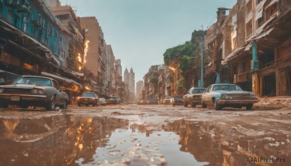 outdoors,sky,day,water,tree,blue sky,no humans,ground vehicle,building,scenery,motor vehicle,snow,reflection,city,car,road,ruins,winter,vehicle focus,lamppost,street,truck,real world location,fire,bridge,puddle,vanishing point