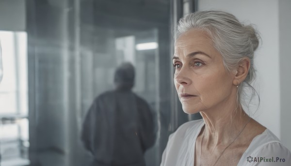 1girl,short hair,blue eyes,shirt,1boy,jewelry,closed mouth,white shirt,upper body,white hair,grey hair,solo focus,indoors,necklace,hair bun,blurry,lips,blurry background,single hair bun,realistic,old,old woman,earrings,grey eyes,depth of field,scar,portrait,robe,wrinkled skin