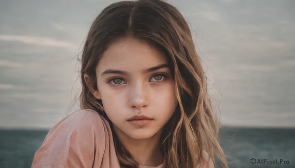 1girl,solo,long hair,looking at viewer,brown hair,shirt,brown eyes,closed mouth,white shirt,upper body,outdoors,sky,day,cloud,water,blurry,lips,grey eyes,blurry background,ocean,wavy hair,expressionless,cloudy sky,portrait,freckles,pink shirt,realistic,nose,horizon,grey sky,depth of field,close-up,forehead,overcast