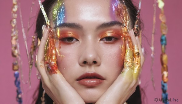 1girl,solo,long hair,looking at viewer,simple background,black hair,brown eyes,jewelry,parted lips,blurry,black eyes,lips,makeup,depth of field,pink background,ring,lipstick,gem,portrait,eyeshadow,realistic,red lips,hands on own face,gold,closed mouth,hands up,eyelashes,chain,expressionless,close-up,nose,straight-on,hands on own cheeks,gold chain