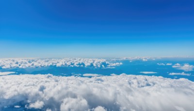 monochrome,outdoors,sky,day,cloud,blue sky,no humans,ocean,cloudy sky,scenery,blue theme,city,horizon,cityscape,landscape,above clouds,water