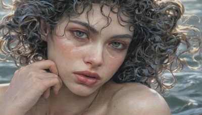 1girl,solo,looking at viewer,short hair,brown hair,black hair,bare shoulders,green eyes,parted lips,hand up,water,lips,grey eyes,wavy hair,messy hair,portrait,close-up,freckles,curly hair,underwater,realistic,nose,long hair,nude,eyelashes,floating hair,wind,mole on cheek