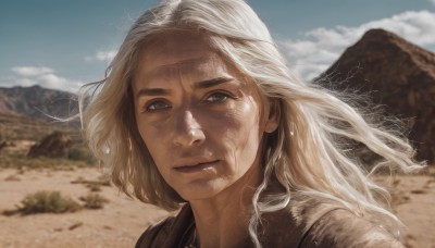 1girl,solo,long hair,looking at viewer,blonde hair,closed mouth,white hair,outdoors,sky,day,cloud,blurry,blue sky,lips,grey eyes,depth of field,blurry background,portrait,mountain,realistic,dirty,desert,dirty face,thick eyebrows,cloudy sky,wind,messy hair,close-up