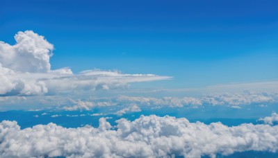 monochrome,outdoors,sky,day,cloud,water,blue sky,no humans,ocean,cloudy sky,scenery,blue theme,horizon,landscape,above clouds