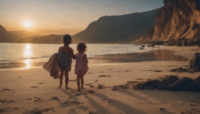 1girl,short hair,multiple girls,brown hair,shirt,black hair,1boy,dress,holding,2girls,standing,short sleeves,outdoors,sky,barefoot,water,from behind,holding hands,ocean,beach,child,scenery,walking,sunset,rock,mountain,sand,sun,horizon,holding clothes,female child,facing away,mountainous horizon,shore,footprints,bare shoulders,shadow,sunlight,desert