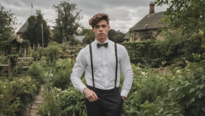 solo,looking at viewer,short hair,brown hair,shirt,long sleeves,1boy,bow,brown eyes,jewelry,standing,white shirt,male focus,cowboy shot,outdoors,parted lips,sky,day,collared shirt,pants,cloud,bowtie,tree,dress shirt,black bow,black pants,ring,suspenders,cloudy sky,building,hand in pocket,black bowtie,realistic,house,pompadour,grass,plant,scenery,bush