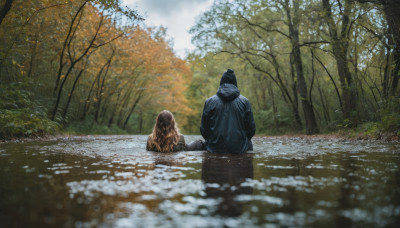 1girl, long hair, brown hair, 1boy, sitting, outdoors, sky, day, hood, from behind, blurry, tree, grass, nature, scenery, forest