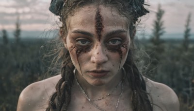 1girl,solo,long hair,looking at viewer,brown hair,black hair,bare shoulders,brown eyes,jewelry,closed mouth,braid,outdoors,necklace,mole,blurry,lips,blood,depth of field,blurry background,messy hair,portrait,freckles,blood on face,realistic,dirty,mole on cheek,tree,close-up,dirty face