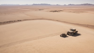 outdoors,sky,day,military,no humans,shadow,beach,ground vehicle,scenery,motor vehicle,sand,military vehicle,tank,vehicle focus,caterpillar tracks,desert,water,ocean,car,shore