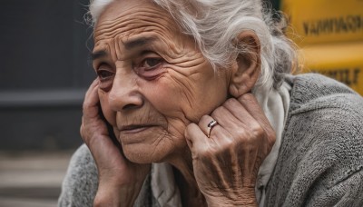 solo,looking at viewer,1boy,jewelry,closed mouth,upper body,white hair,male focus,blurry,black eyes,lips,blurry background,ring,portrait,realistic,hands on own face,old,old man,old woman,wrinkled skin,shirt,grey hair,artist name,signature,dated,sweater,head rest