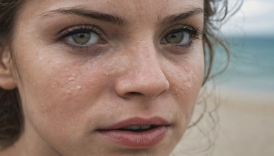 1girl,solo,looking at viewer,brown hair,brown eyes,outdoors,parted lips,teeth,day,water,blurry,lips,wet,eyelashes,depth of field,blurry background,ocean,beach,portrait,close-up,realistic,nose,open mouth,eye focus