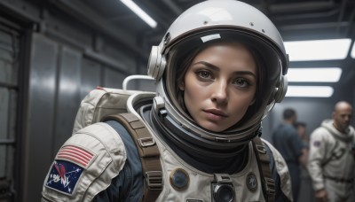 1girl,looking at viewer,brown hair,black hair,brown eyes,closed mouth,upper body,multiple boys,solo focus,indoors,bag,blurry,lips,depth of field,blurry background,backpack,helmet,science fiction,realistic,bald,american flag,spacesuit,astronaut,short hair,2boys,expressionless,thick eyebrows,3boys,portrait,forehead,serious,spacecraft,space helmet