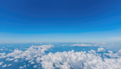 monochrome,outdoors,sky,day,cloud,water,blue sky,dutch angle,no humans,ocean,cloudy sky,scenery,blue theme,horizon,landscape