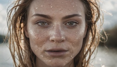 1girl,solo,long hair,looking at viewer,brown hair,brown eyes,closed mouth,outdoors,water,blurry,lips,wet,depth of field,blurry background,thick eyebrows,portrait,close-up,freckles,realistic,nose,wet hair,straight-on,sky,day,eyelashes,messy hair,water drop