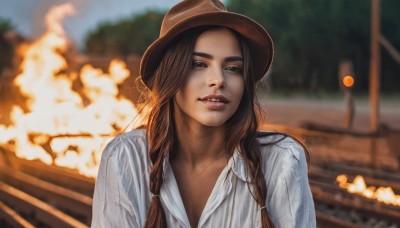 1girl,solo,long hair,looking at viewer,brown hair,shirt,hat,brown eyes,white shirt,upper body,braid,outdoors,parted lips,teeth,day,collared shirt,blurry,black eyes,twin braids,lips,depth of field,blurry background,freckles,realistic,nose,brown headwear,explosion,cowboy hat,dark skin