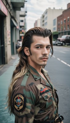 solo,long hair,looking at viewer,blonde hair,brown hair,black hair,long sleeves,1boy,brown eyes,closed mouth,jacket,upper body,male focus,multicolored hair,outdoors,parted lips,day,belt,blurry,uniform,black eyes,from side,lips,military,military uniform,depth of field,blurry background,facial hair,ground vehicle,building,motor vehicle,beard,pocket,brown jacket,city,realistic,stubble,car,road,breast pocket,camouflage,badge,police,street,patch,nose,mustache,leather,leather jacket,camouflage jacket