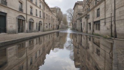 outdoors,sky,day,cloud,water,tree,no humans,window,building,scenery,reflection,stairs,door,road,house,bridge,lamppost,river,reflective water,blue sky,cloudy sky,plant,bush,bare tree,street,puddle