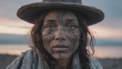 1girl,solo,long hair,looking at viewer,brown hair,hat,brown eyes,outdoors,parted lips,sky,teeth,day,medium hair,blurry,lips,depth of field,blurry background,portrait,freckles,realistic,brown headwear,dirty,cowboy hat,dirty face,blue eyes,black hair,closed mouth,thick eyebrows,close-up,straw hat