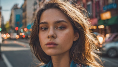 1girl, solo, long hair, looking at viewer, blonde hair, brown hair, outdoors, parted lips, mole, blurry, lips, depth of field, blurry background, thick eyebrows, ground vehicle, portrait, mole under mouth, motor vehicle, freckles, realistic, nose, car, road, mole on cheek