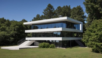 outdoors,sky,day,tree,blue sky,no humans,window,grass,building,nature,scenery,forest,fence,road,bush,house,school