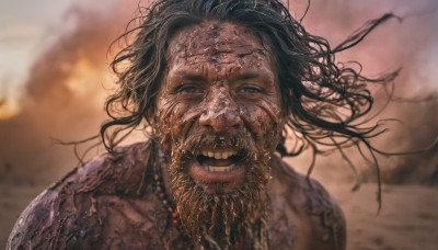 solo,looking at viewer,smile,open mouth,blue eyes,black hair,1boy,jewelry,upper body,male focus,outdoors,teeth,necklace,blurry,floating hair,depth of field,blurry background,facial hair,wind,messy hair,portrait,beard,realistic,sand,desert,long hair,grin,grey eyes,stubble