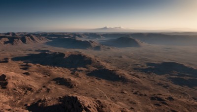 monochrome,outdoors,sky,day,cloud,blue sky,no humans,grass,nature,scenery,rock,mountain,sand,horizon,landscape,mountainous horizon,desert,water,beach,sunlight,shore