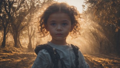 1girl,solo,looking at viewer,short hair,blue eyes,brown hair,shirt,closed mouth,white shirt,upper body,outdoors,tree,lips,wavy hair,expressionless,sunlight,suspenders,child,nature,forest,backlighting,curly hair,realistic,nose,overalls,day,wind,portrait,dappled sunlight