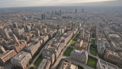 outdoors,sky,water,no humans,ocean,from above,building,scenery,city,road,cityscape,bridge,river,skyscraper,landscape,rooftop,day,cloud,tree,horizon,shore