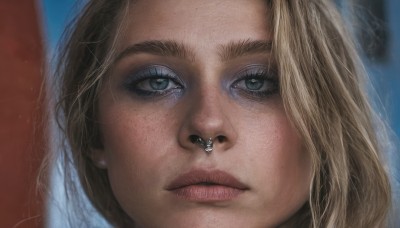 1girl,solo,looking at viewer,blue eyes,blonde hair,parted lips,teeth,blurry,lips,eyelashes,blurry background,piercing,portrait,close-up,freckles,realistic,nose,nose piercing,blue background