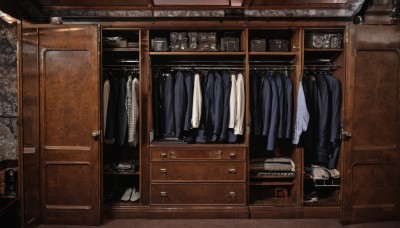 shirt,jacket,indoors,no humans,box,scenery,door,still life,clothes hanger,cabinet,clothes,shoes,sneakers,shelf,chest of drawers