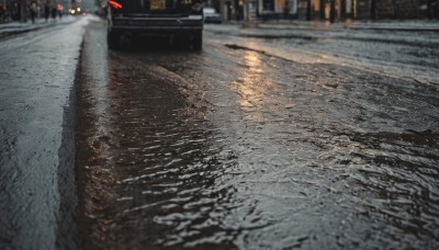 outdoors,blurry,no humans,night,depth of field,ground vehicle,building,scenery,motor vehicle,city,realistic,car,road,lamppost,street,photo background,real world location,tree,blurry background,umbrella,snow,rain,pavement,sidewalk