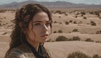 1girl,solo,long hair,brown hair,black hair,hair ornament,brown eyes,jewelry,closed mouth,upper body,flower,earrings,outdoors,day,hair flower,armor,blurry,lips,depth of field,blurry background,portrait,freckles,mountain,realistic,nose,field,parted lips,sky,looking away,sand,looking afar,desert