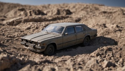 outdoors,day,blurry,no humans,depth of field,blurry background,ground vehicle,motor vehicle,car,vehicle focus,photo background,desert,wheel,sky,rock,sports car